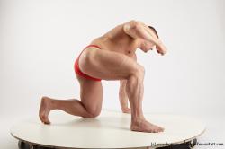 Swimsuit Man White Kneeling poses - ALL Muscular Short Brown Kneeling poses - on one knee Academic